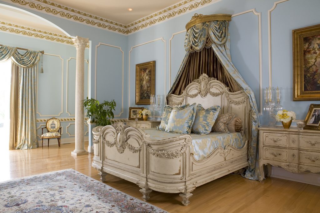 Custom Bedroom with blue, beige and gold accents with antiqued furniture