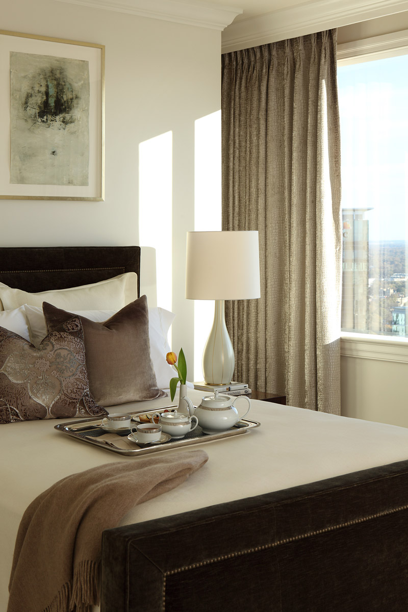 Guest Bedroom with neutral palette with a tray of fine china in a Four Seasons Penthouse