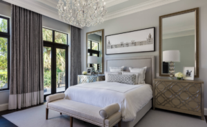 Master Bedroom with neutral colors and a chandelier