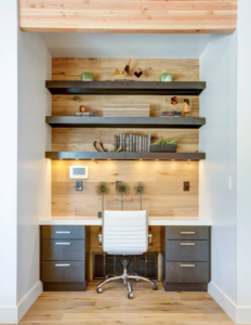 White office chair with a minimalist built-in desk and shelves