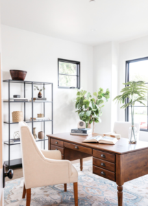 Beige chair in home office with natural lighting