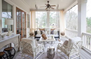 Outdoor Living space with swing loveseat in beige