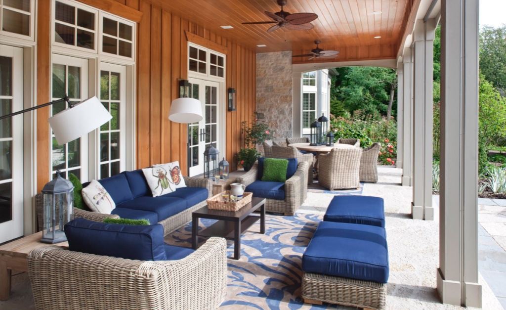 Outdoor living room with blue and tan furniture